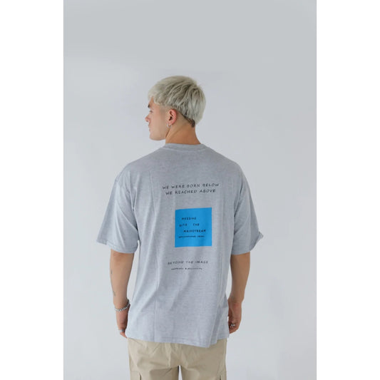 REMERA OVER UNKNONW GRIS